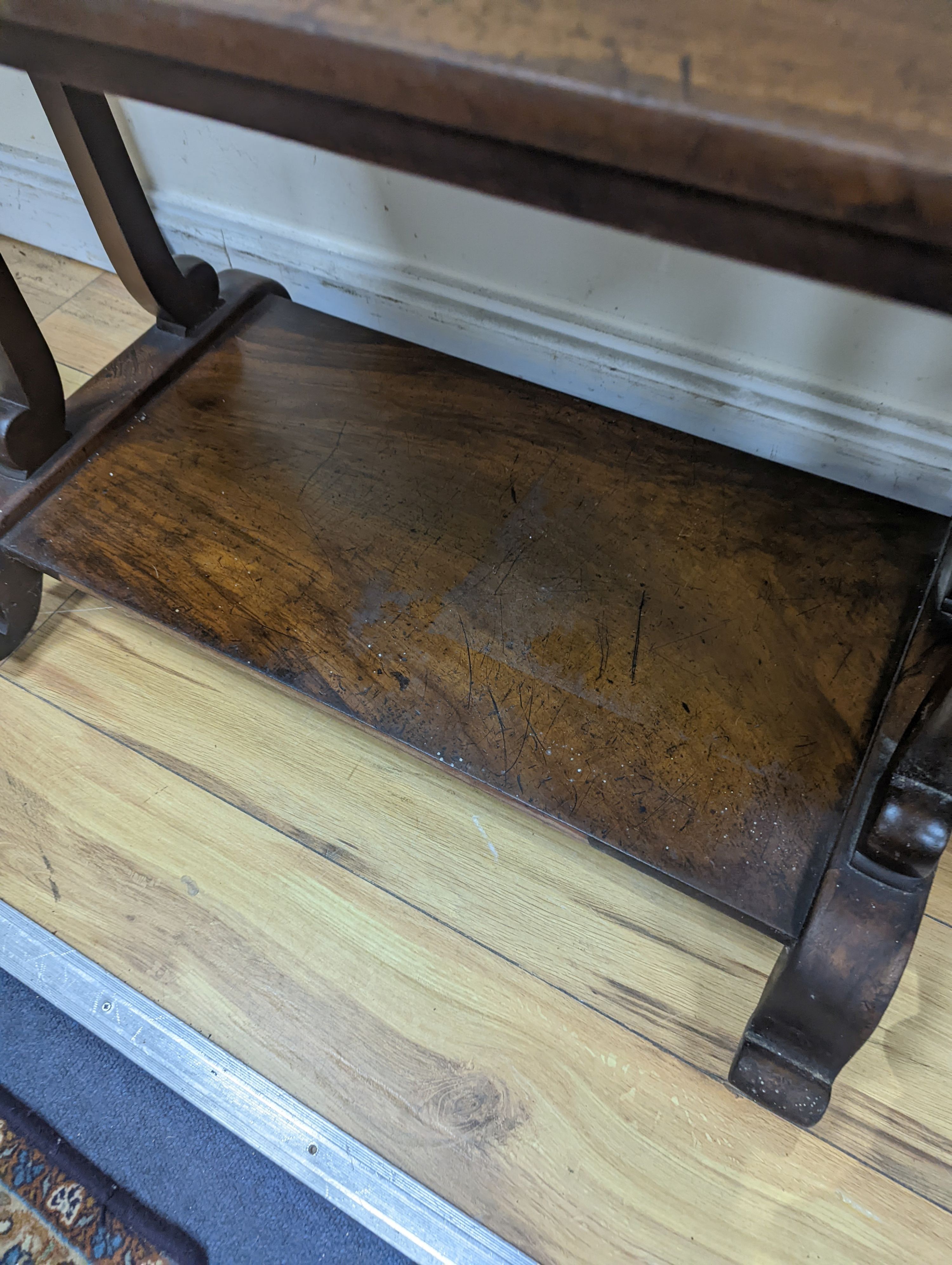 A Victorian rosewood three tier table. W-73cm, D-38cm, H-92cm.